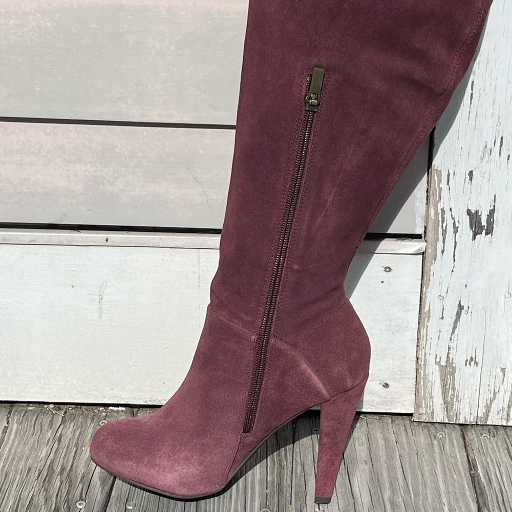 Over the knee burgundy boot.